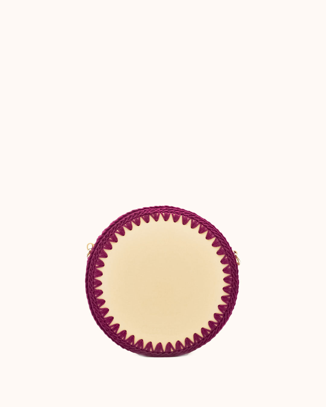 Bolso redondo pequeño artesanal beige de cuero y crochet hecho a mano por Cueché