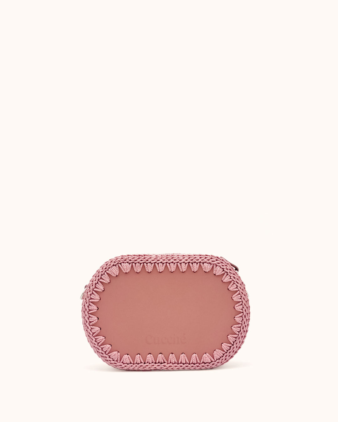 Bolso ovalado pequeño artesanal rosa de cuero y crochet hecho a mano por Cueché